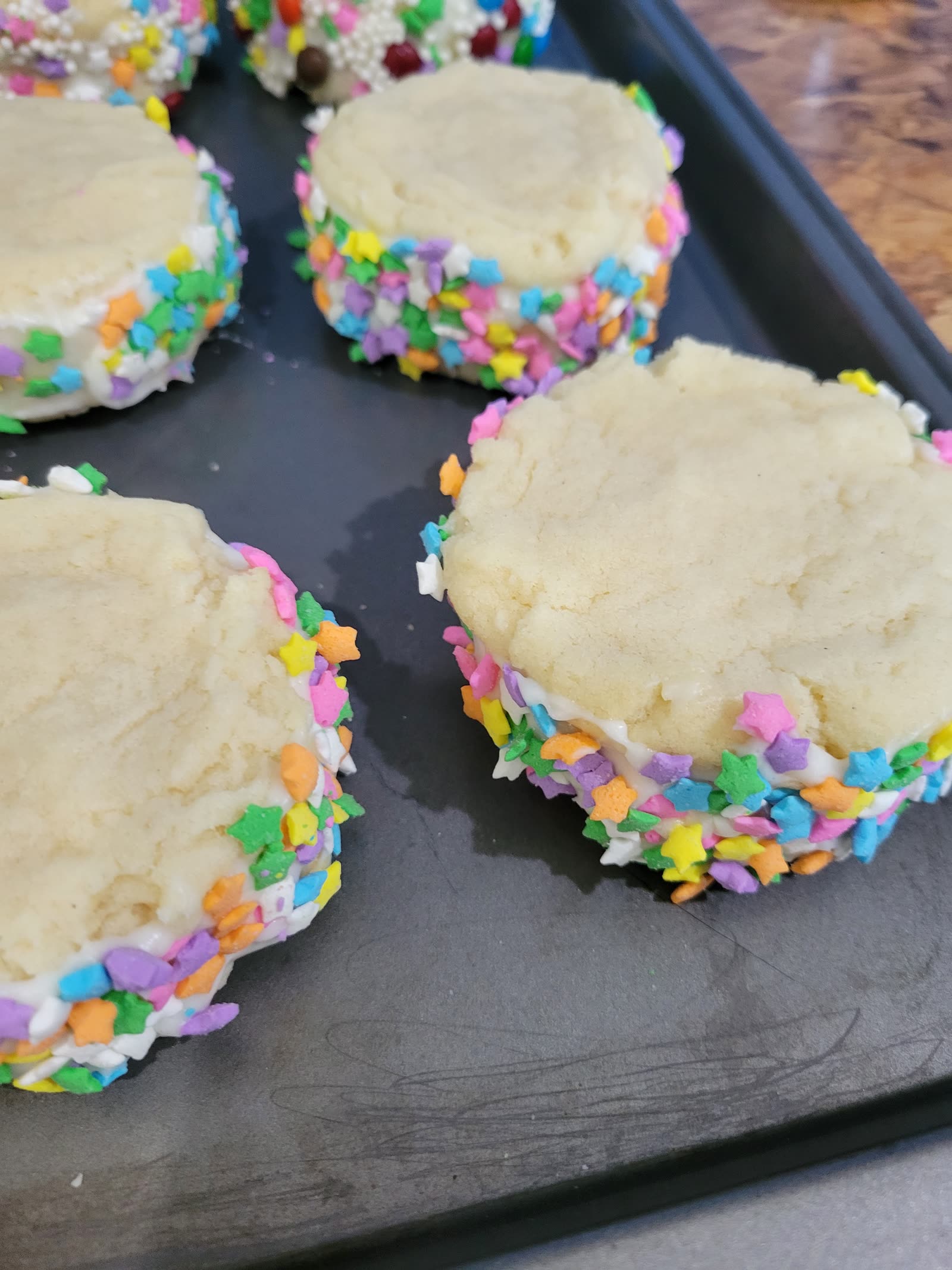 Colorful star-shaped piñata cookies