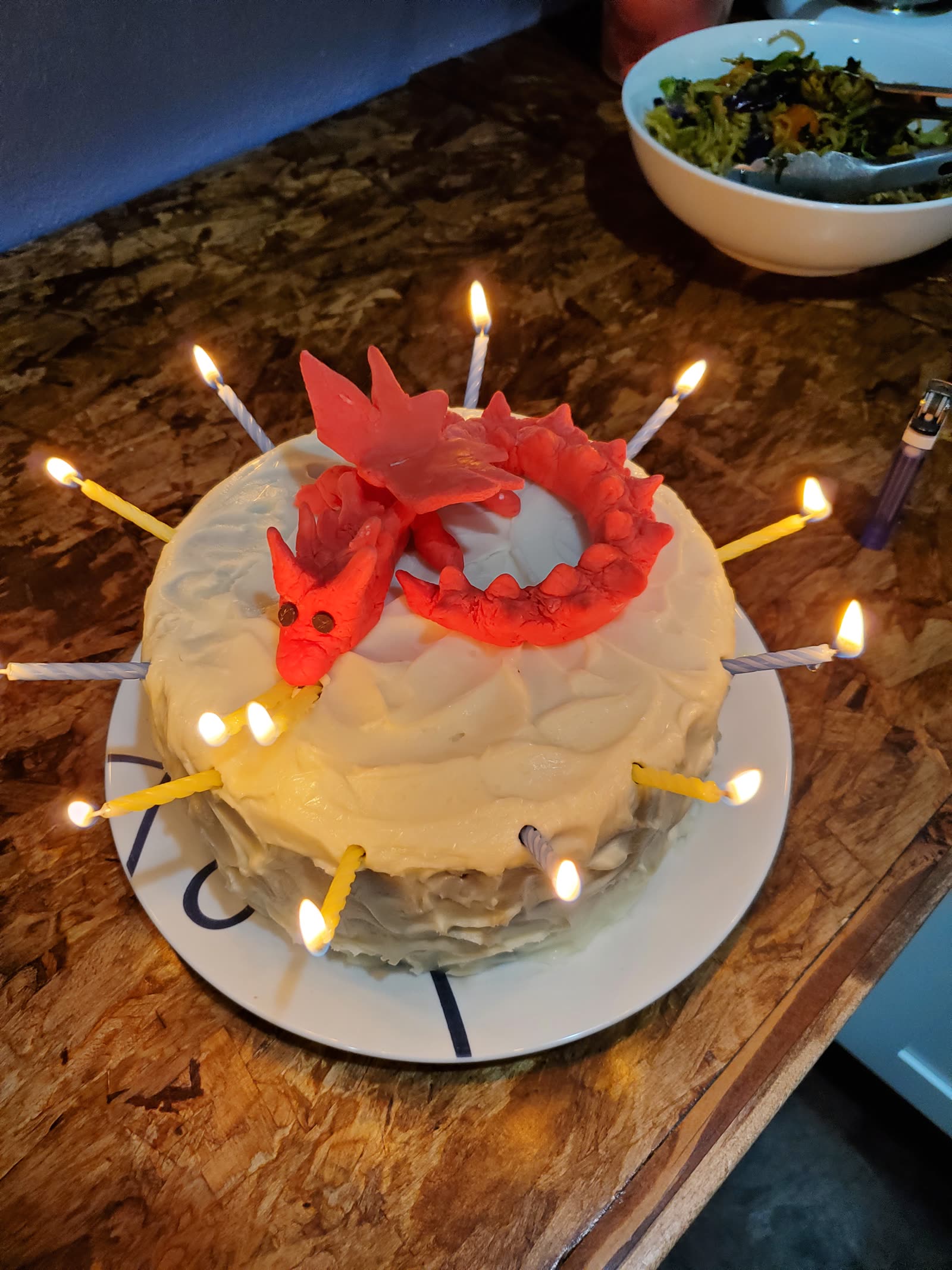 Hand-decorated red dragon birthday cake